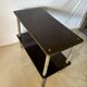 Vintage trolley on wheels, black wood and brass uprights