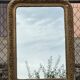 Large gilded sculpted Louis-Philippe mirror, mercury 104x77cm