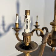 Important six-light chandelier in chiselled gilded bronze, Empire, 19th century