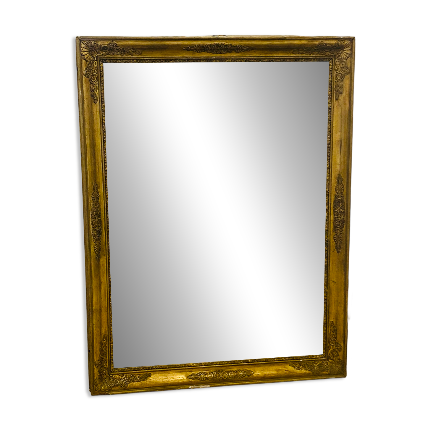 Antique mercury mirror with an Empire gold frame.