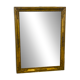 Antique mercury mirror with an Empire gold frame.
