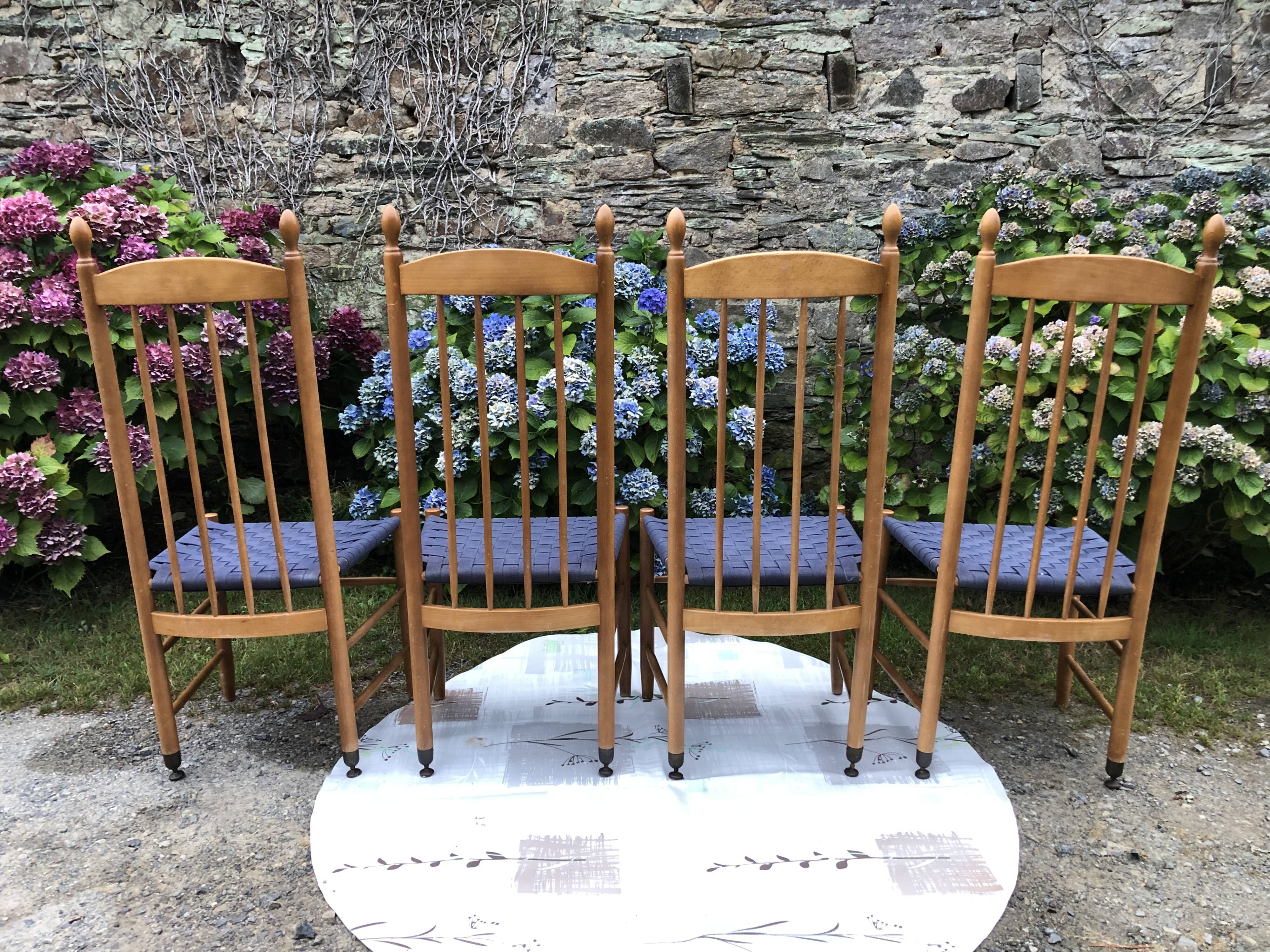 4 vintage Roche Bobois chairs from the 80s in beech with woven seats in blue fabric.
