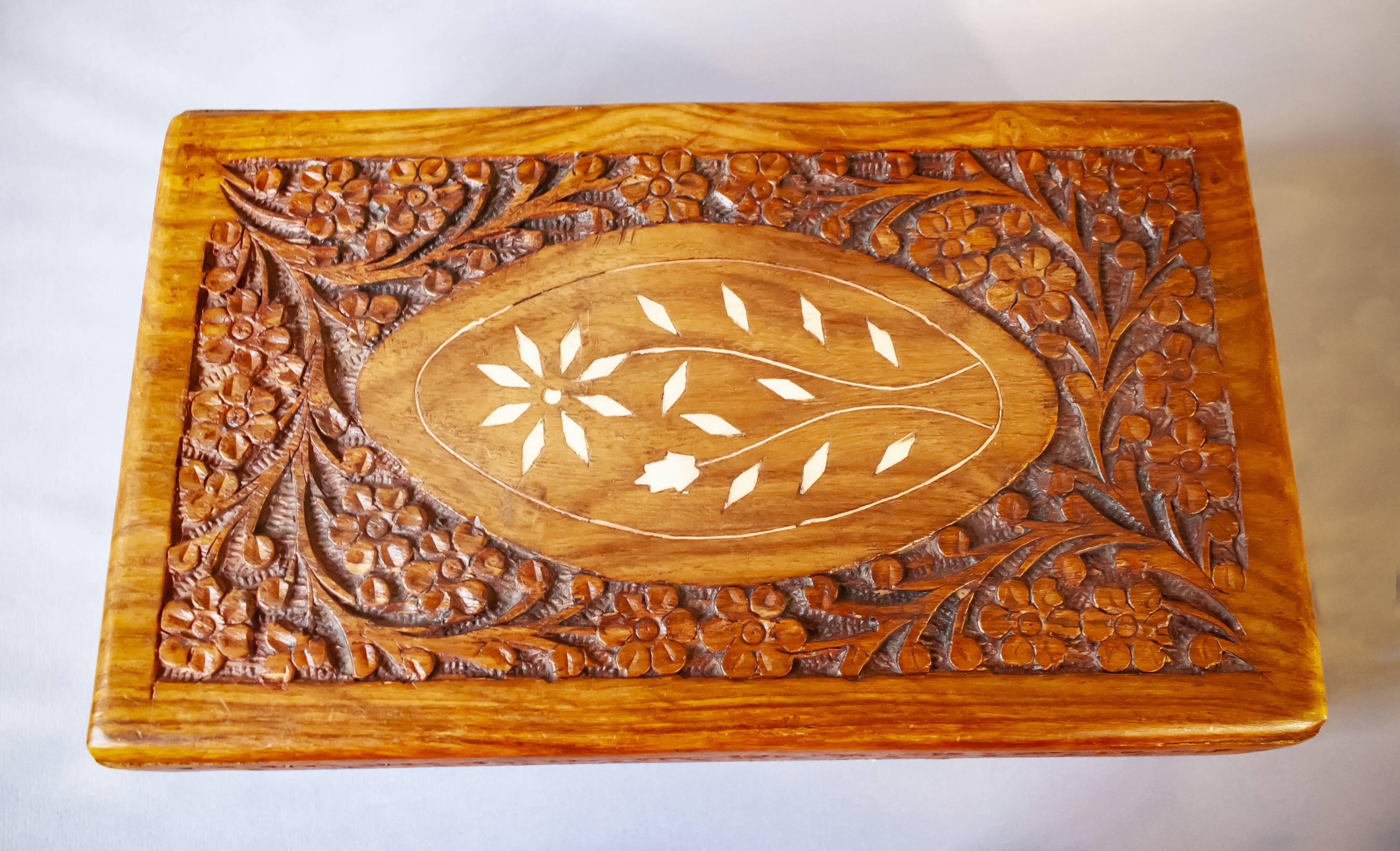 Antique hand-carved wooden boxes.