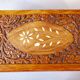 Antique hand-carved wooden boxes.