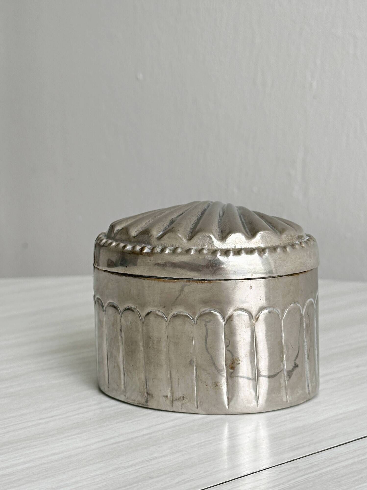 Silver-plated metal catchall with patina