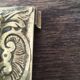 Old brass candle holder with square base