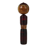 Decorative Kokeshi doll sculpture from northern Japan, hand-painted, signed.