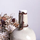 Triangular sandstone bottle