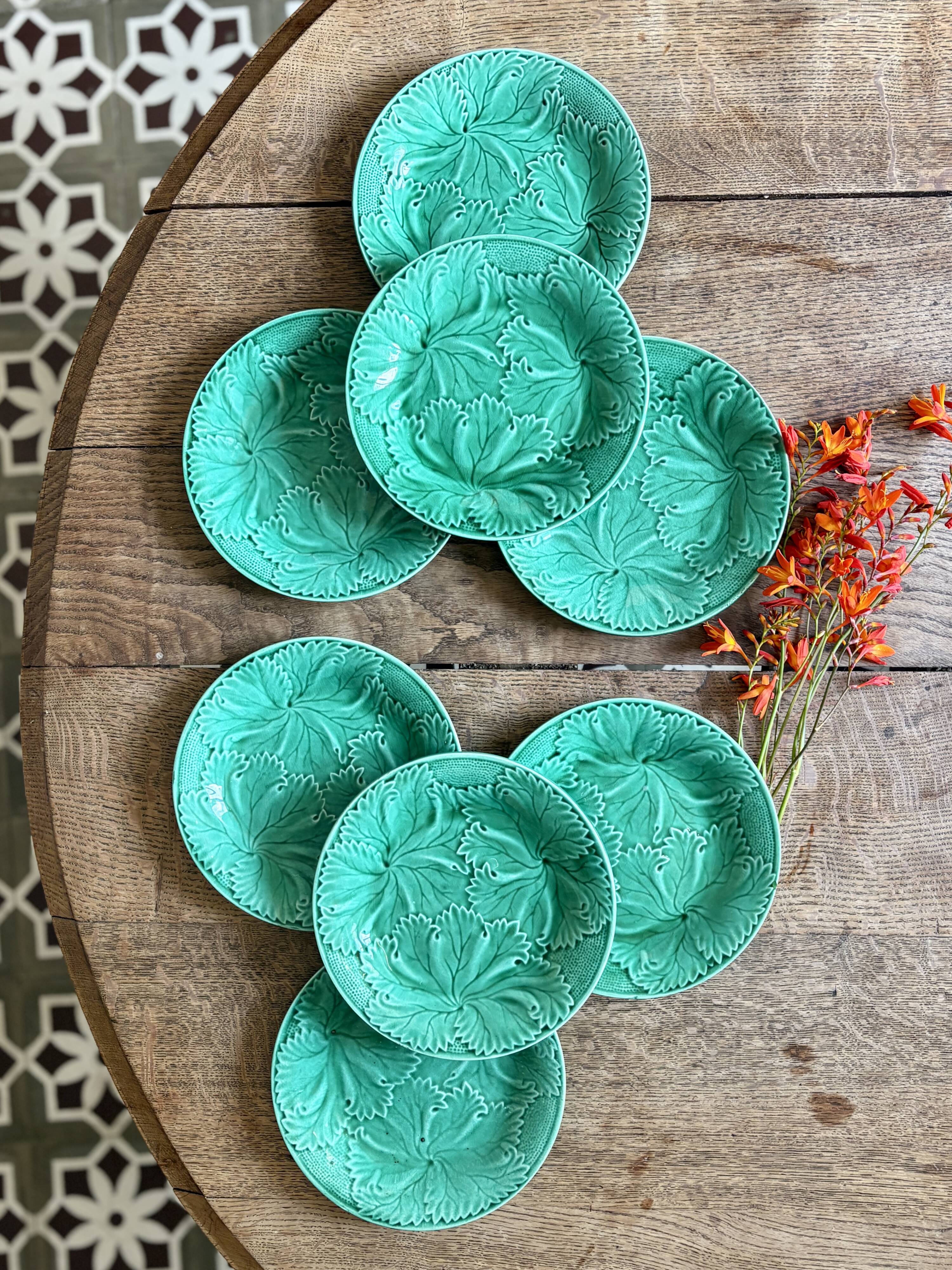 Set of 8 vintage green faience dessert plates, majolica.