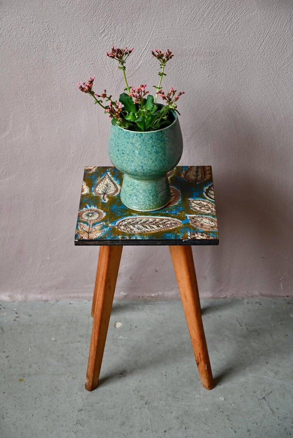 Plant stand side table 1970s Scandinavian patterns with tapered legs.