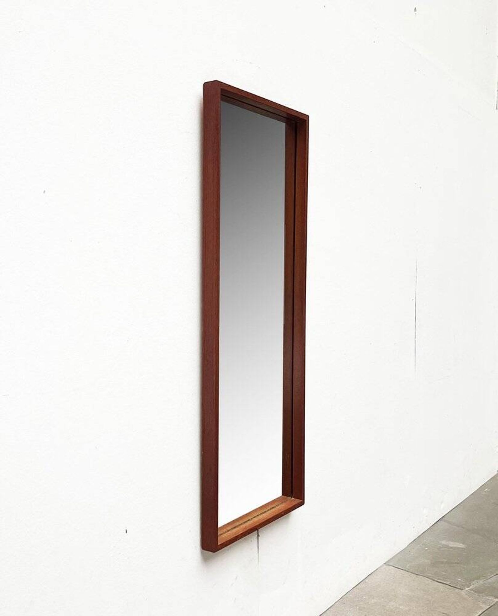 Minimalist mid-century German mirror in teak by Zier-Form, 1960s.