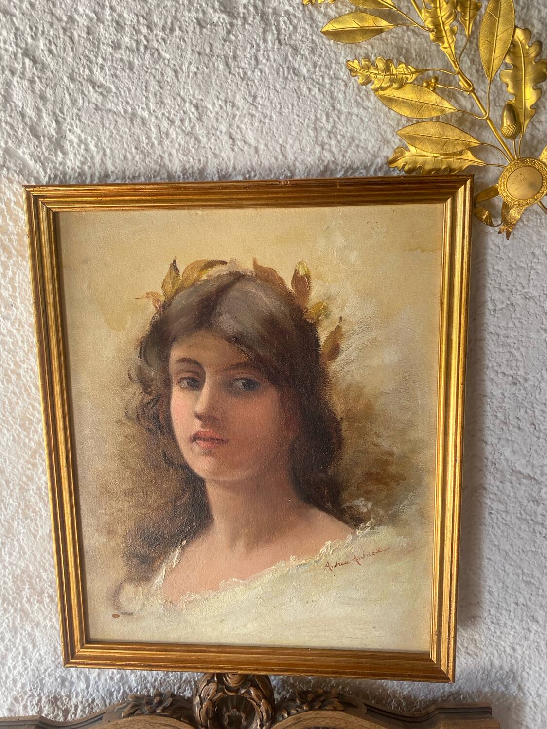 Portrait of a young woman with a laurel crown.