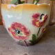 Earthenware cache pot with slip decoration.