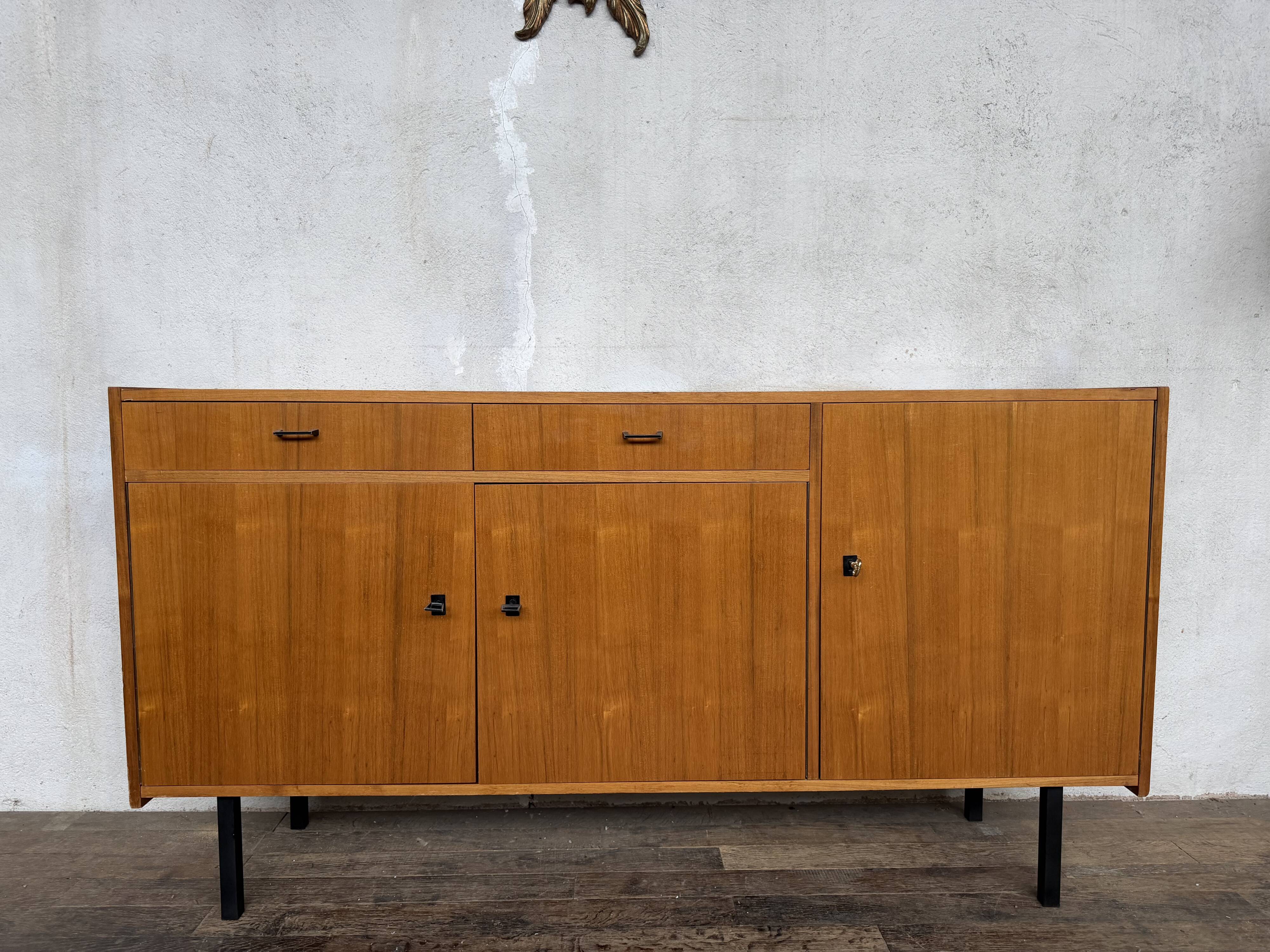 Vintage Scandinavian enfilade with metal legs.