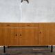 Vintage Scandinavian enfilade with metal legs.
