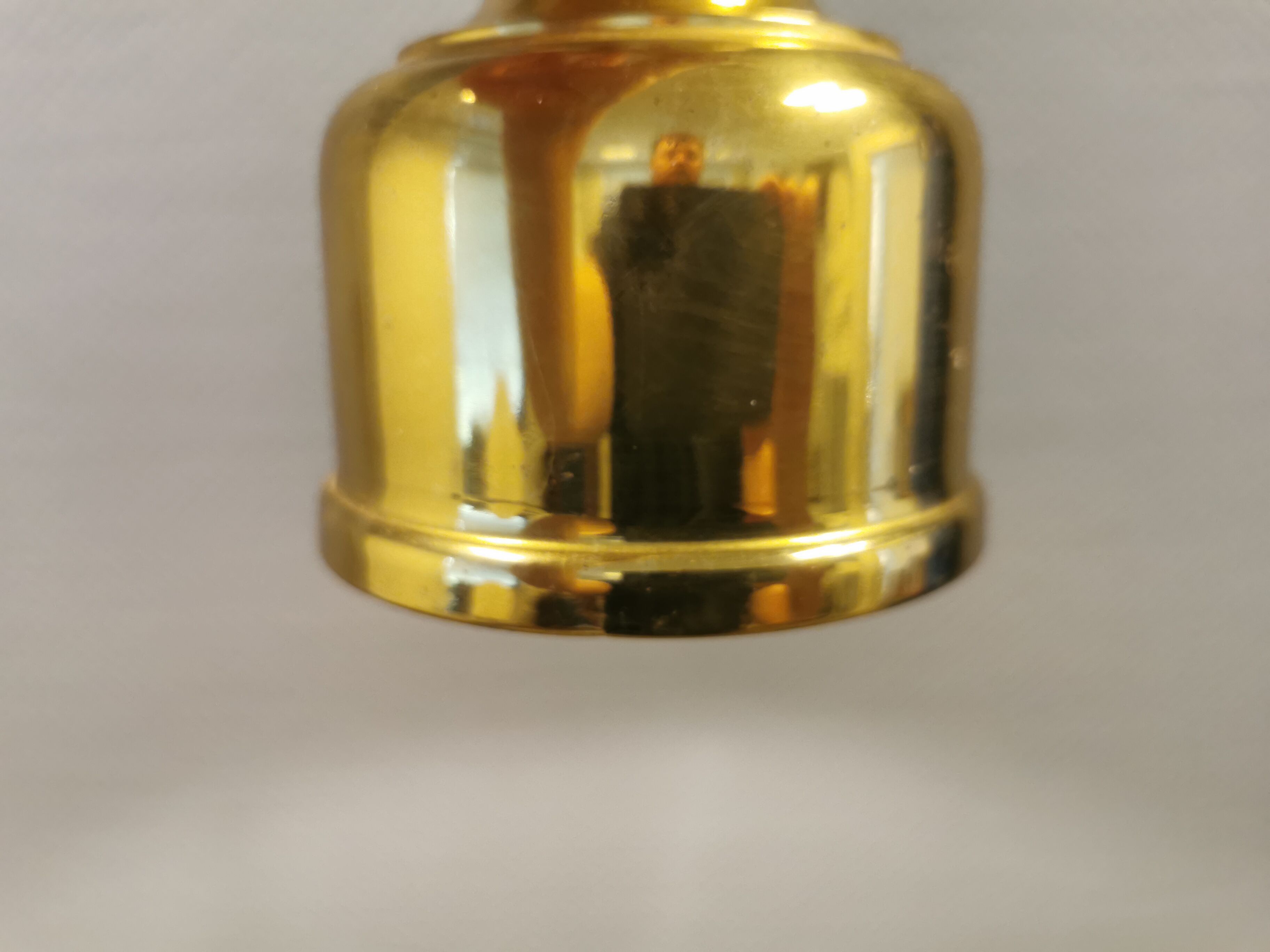 Small golden Danish hanging lamp in metal and brass.