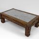 Solid oak coffee table carved with fauns and gray marble top, France, circa 1940
