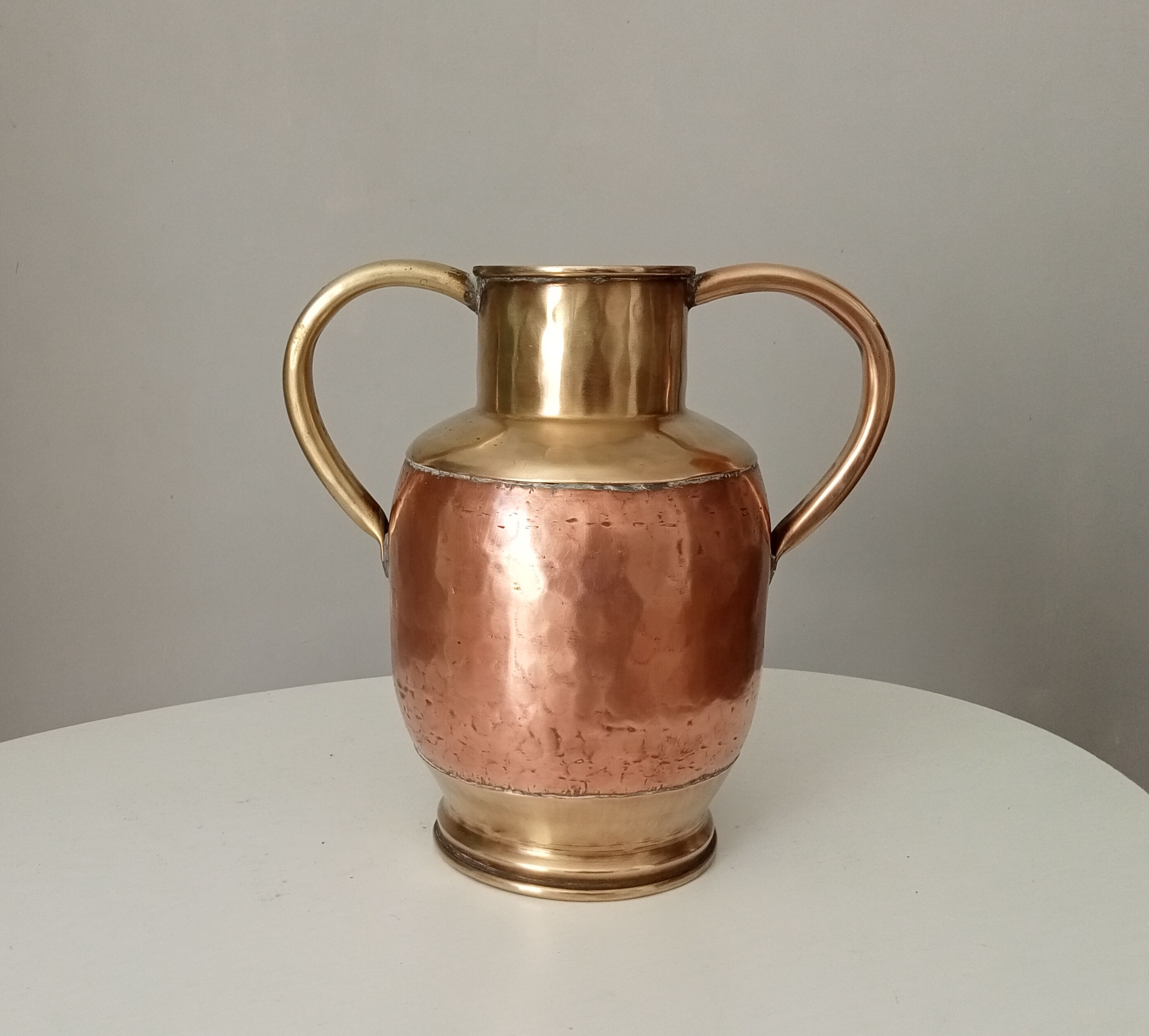 Antique amphora vase in brass and copper