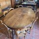 Large oval farmhouse table in solid oak, 19th century, 243 × 153cm
