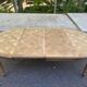 Round extendable dining table Louis XV stripped in solid oak 1950