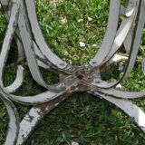 Sheet metal and iron garden table