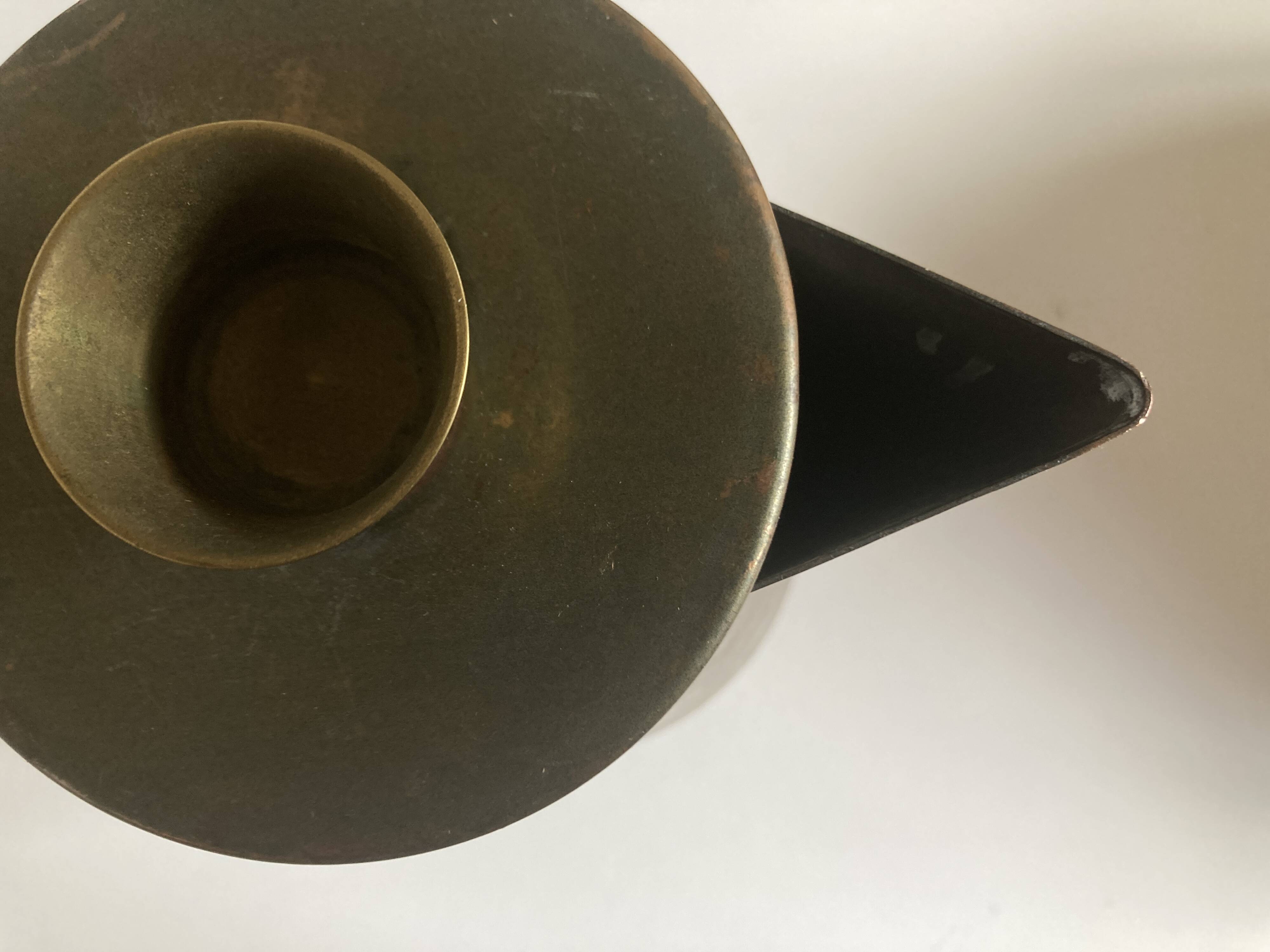 Modernist Italian pitcher design from the 1960s in patinated wood and metal.