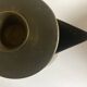 Modernist Italian pitcher design from the 1960s in patinated wood and metal.