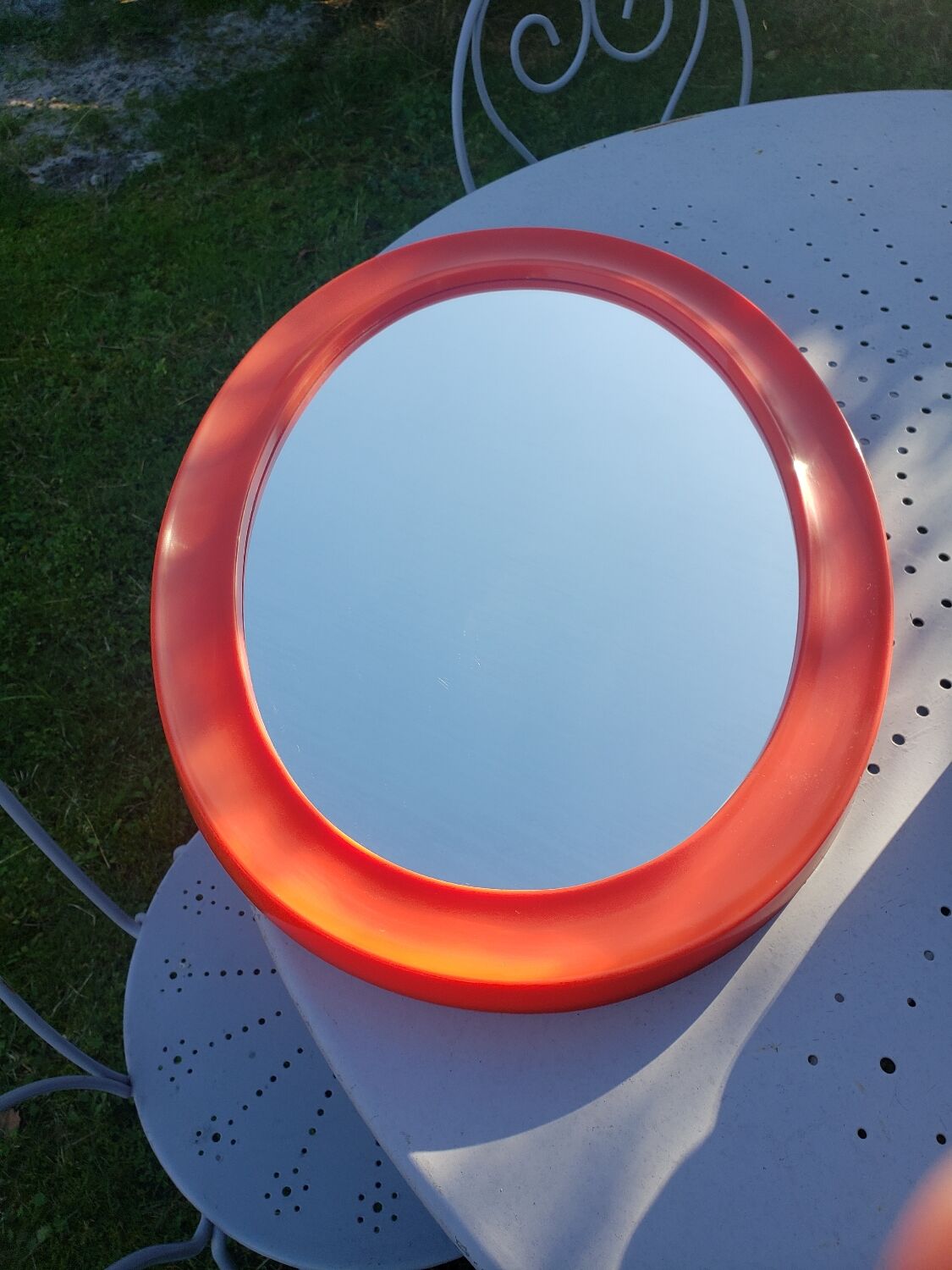 Orange oval mirror 1970 seventie