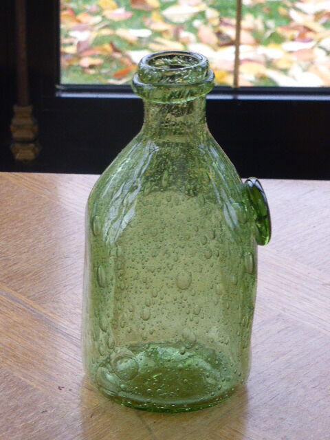 Biot stamped blown glass bottle