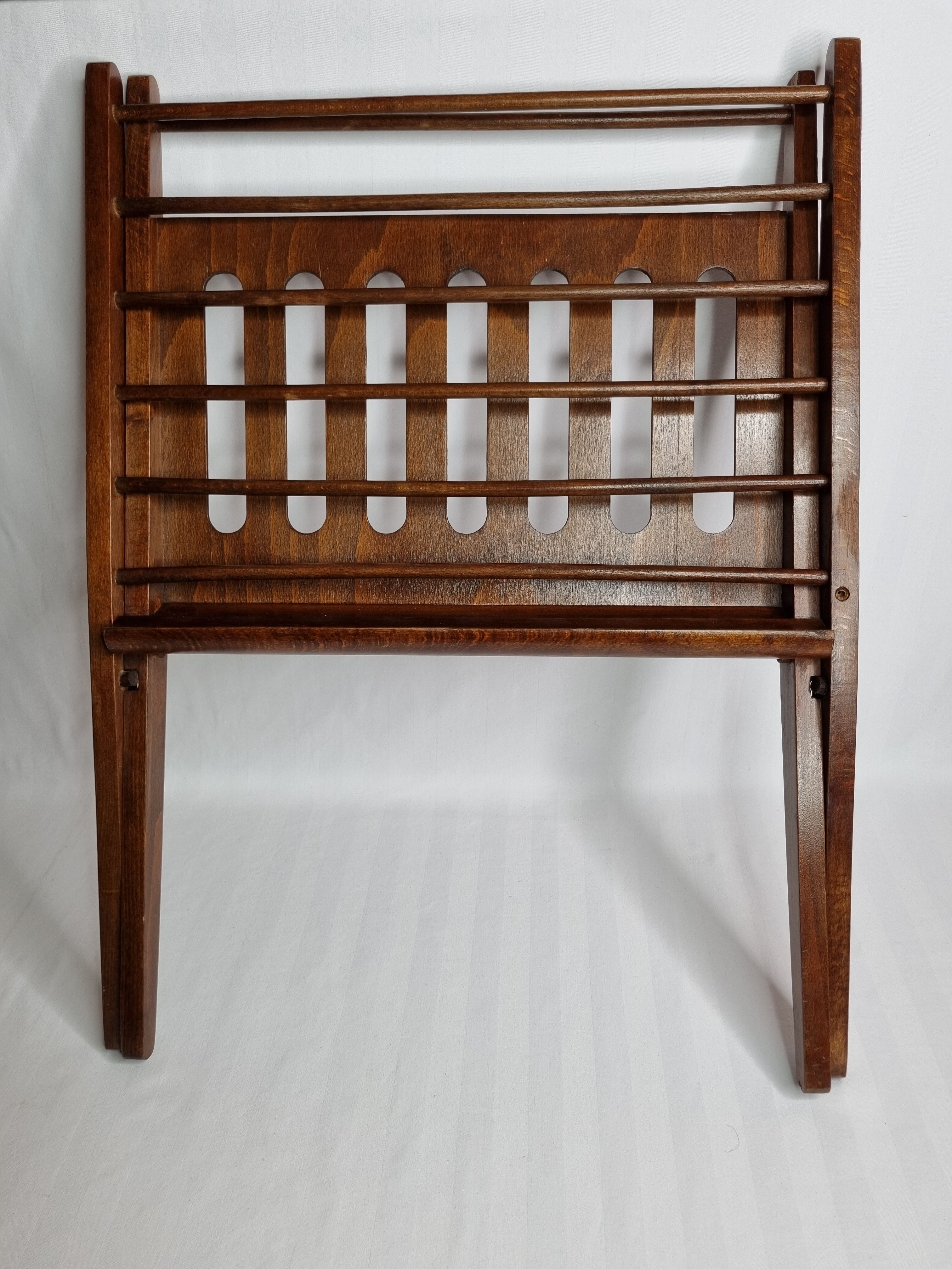 Folding teak magazine door by Cees Braakman