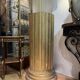 Large fluted golden wood column with a marble top, work from around 1900.
