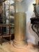Large fluted golden wood column with a marble top, work from around 1900.