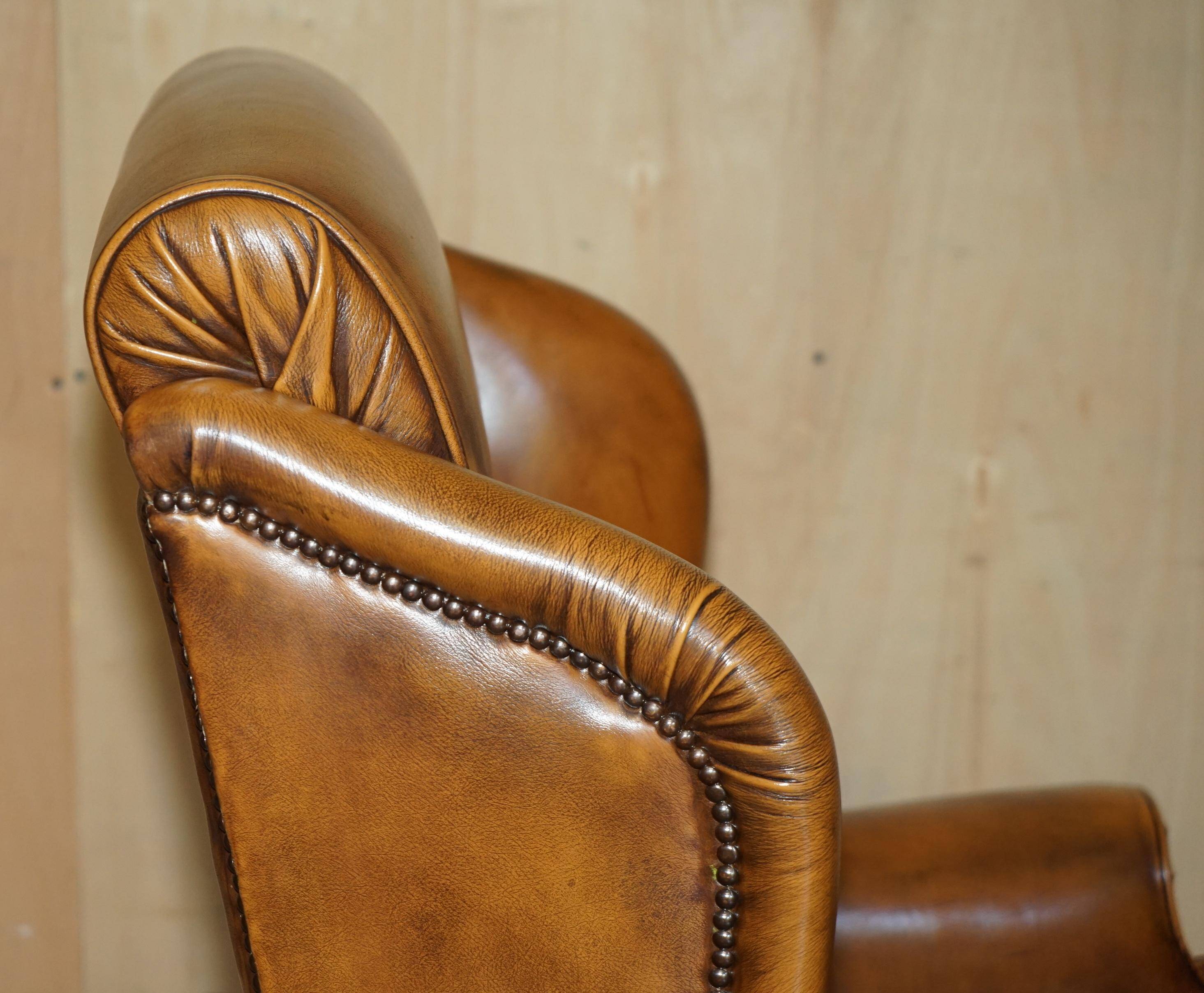 Captain's chair Chesterfield vintage leather with tufted wingback.