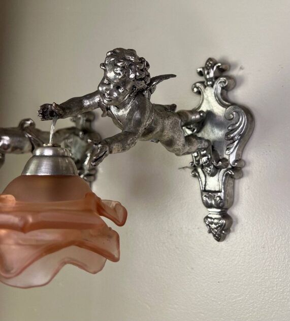 Pair of wall sconces, cherubs, angels, silvered