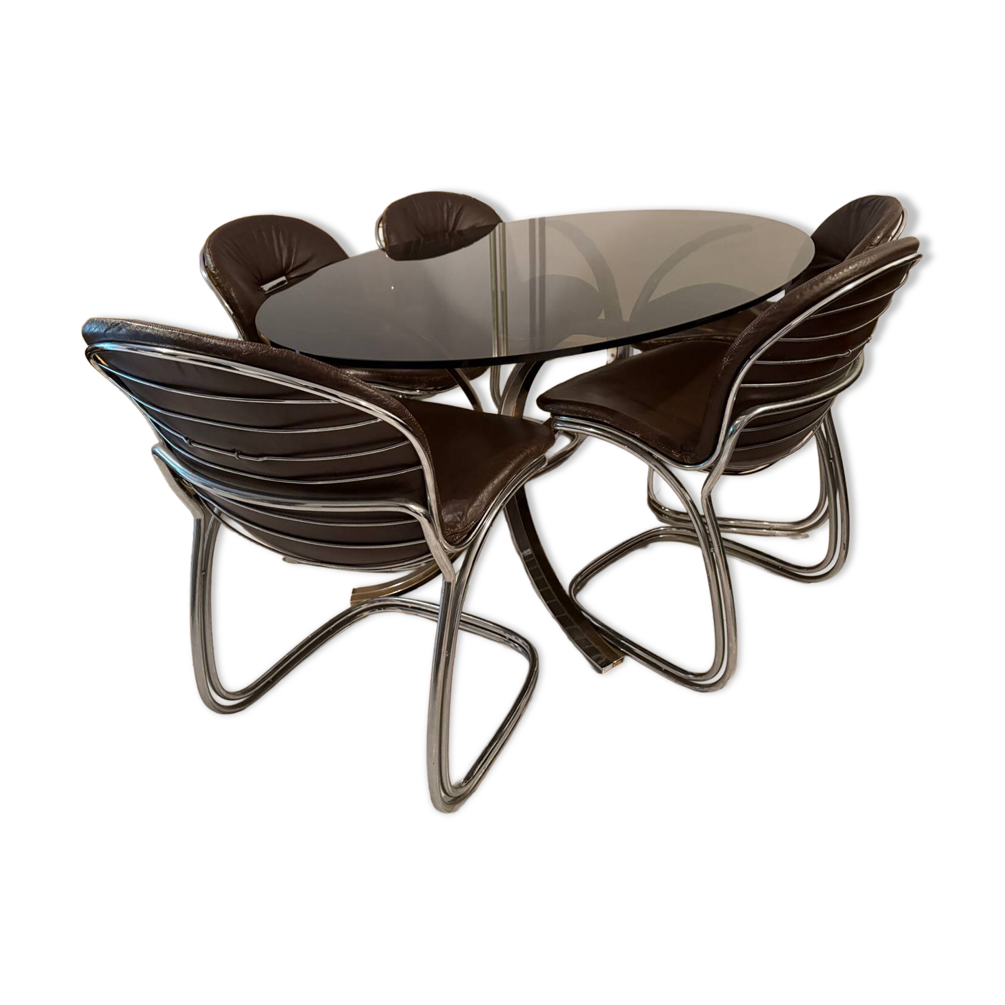 Table and chairs in the style of Gastone Rinaldi.