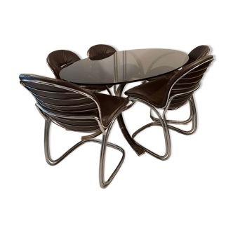 Table and chairs in the style of Gastone Rinaldi.