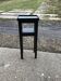 Small black Art Deco side table in wood, 1930s — compact and slender