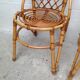 Pair of rattan chairs by Louis Sognot