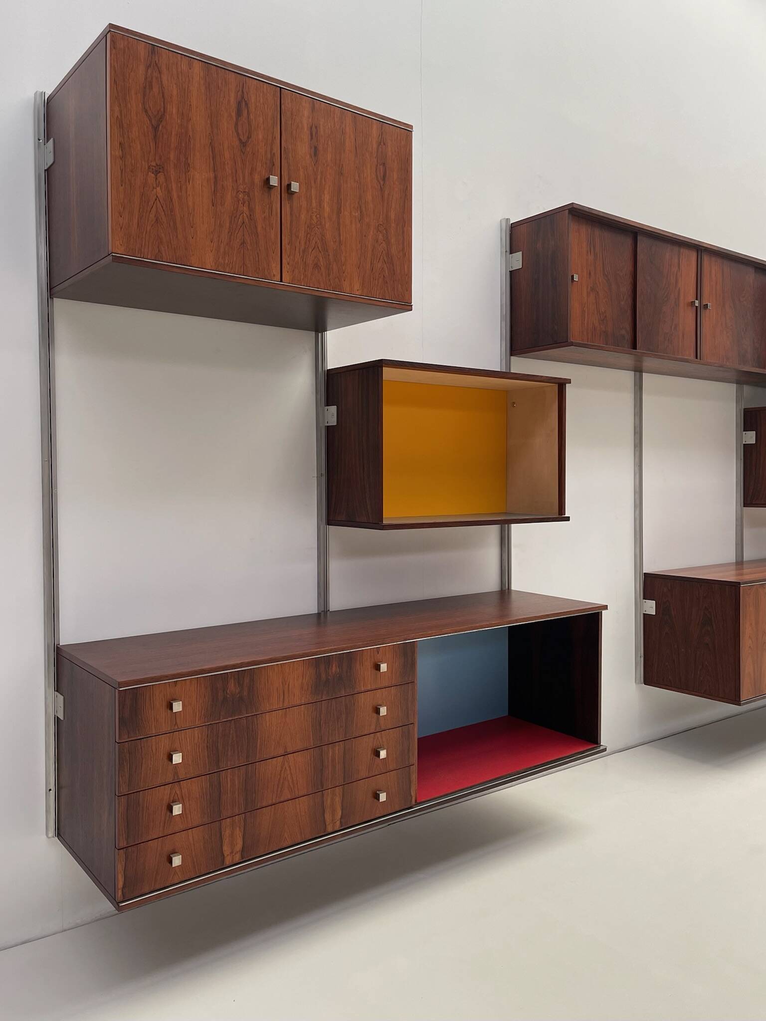 Large colorful wall unit in luxury wood