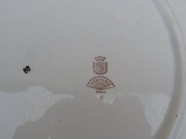 Plat rond 1900 Digoin & Sarreguemine Oiseau des Iles