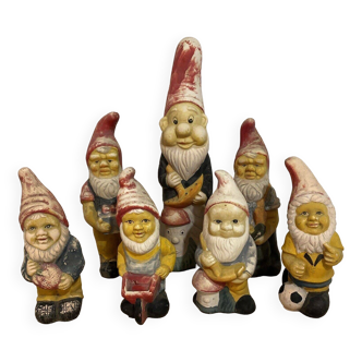 Suite of 7 old garden gnomes in polychrome art plaster