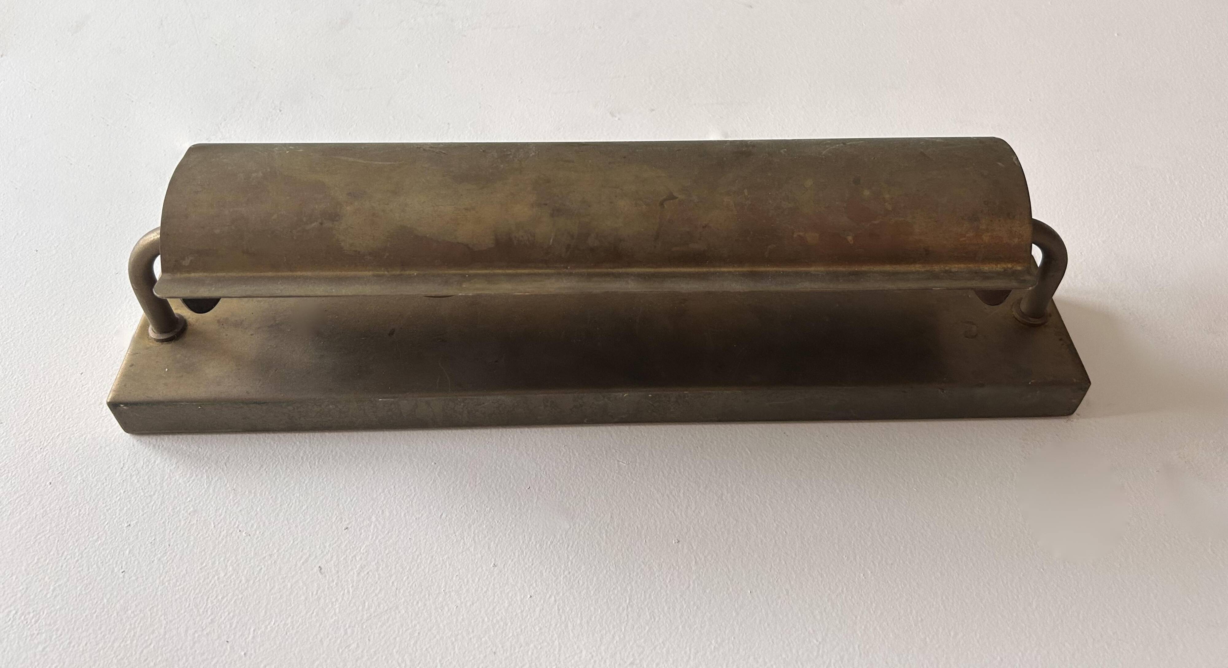 Modernist solid brass wall light, France 1940