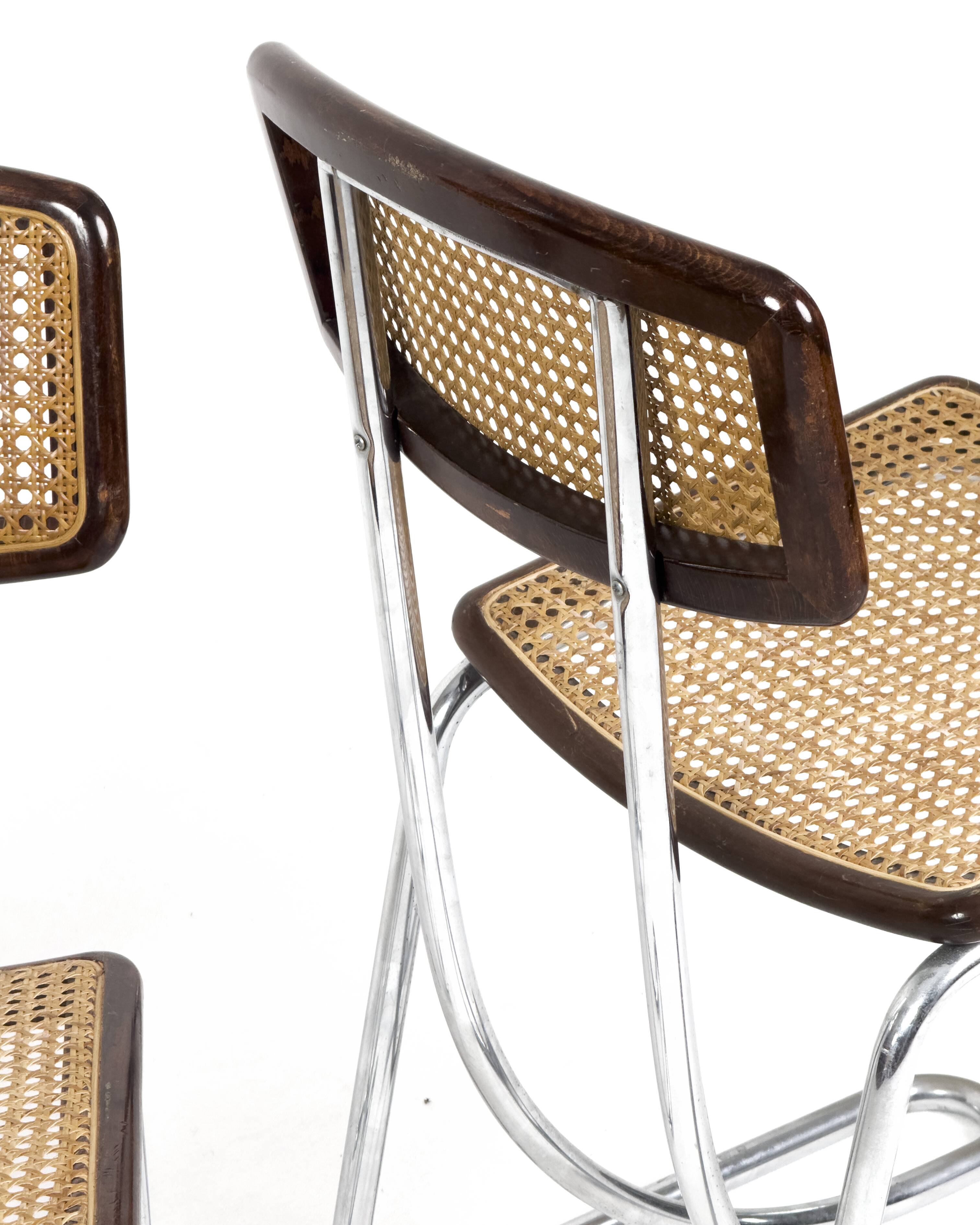 Ensemble de 4 chaises vintage à accoudoirs en chrome, bois et paille de Vienne, années 1970.