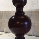 Turned wood table lamp in plum color - 1970s