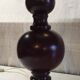 Turned wood table lamp in plum color - 1970s