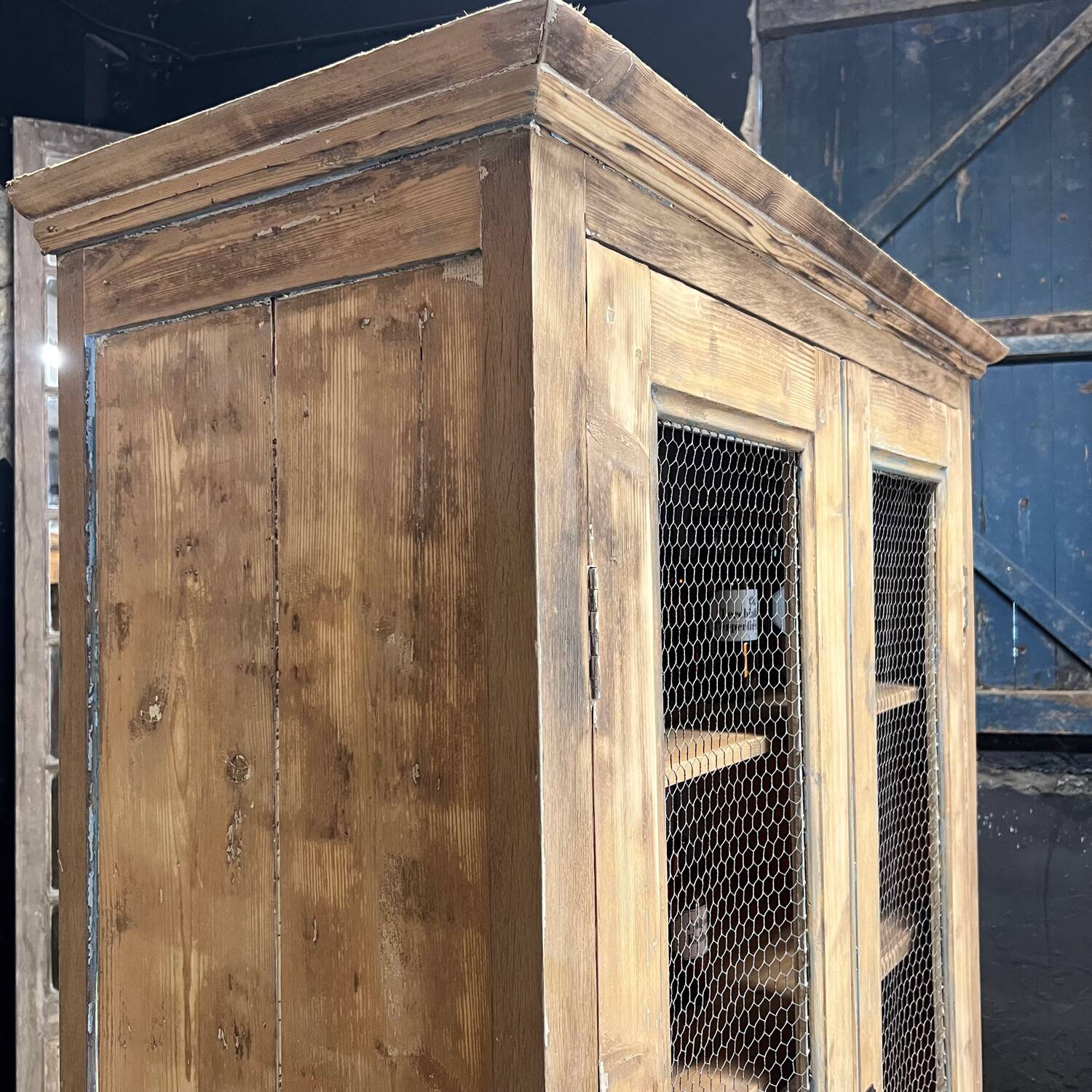 Old patinated mesh cupboard