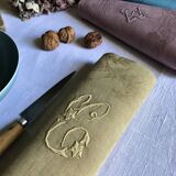 Suite of four tinted antique napkins