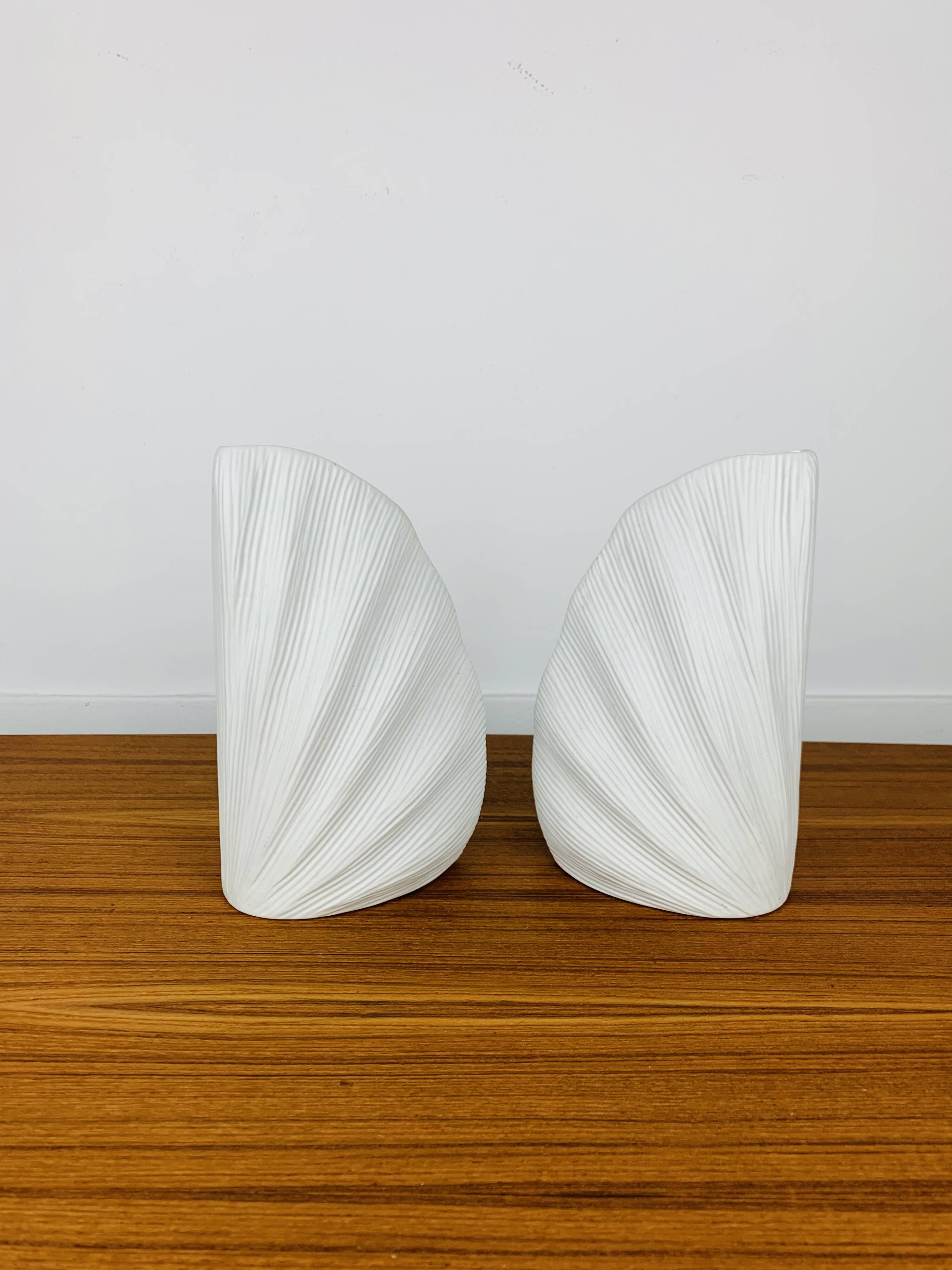 Pair of white ceramic coral vases, bookends