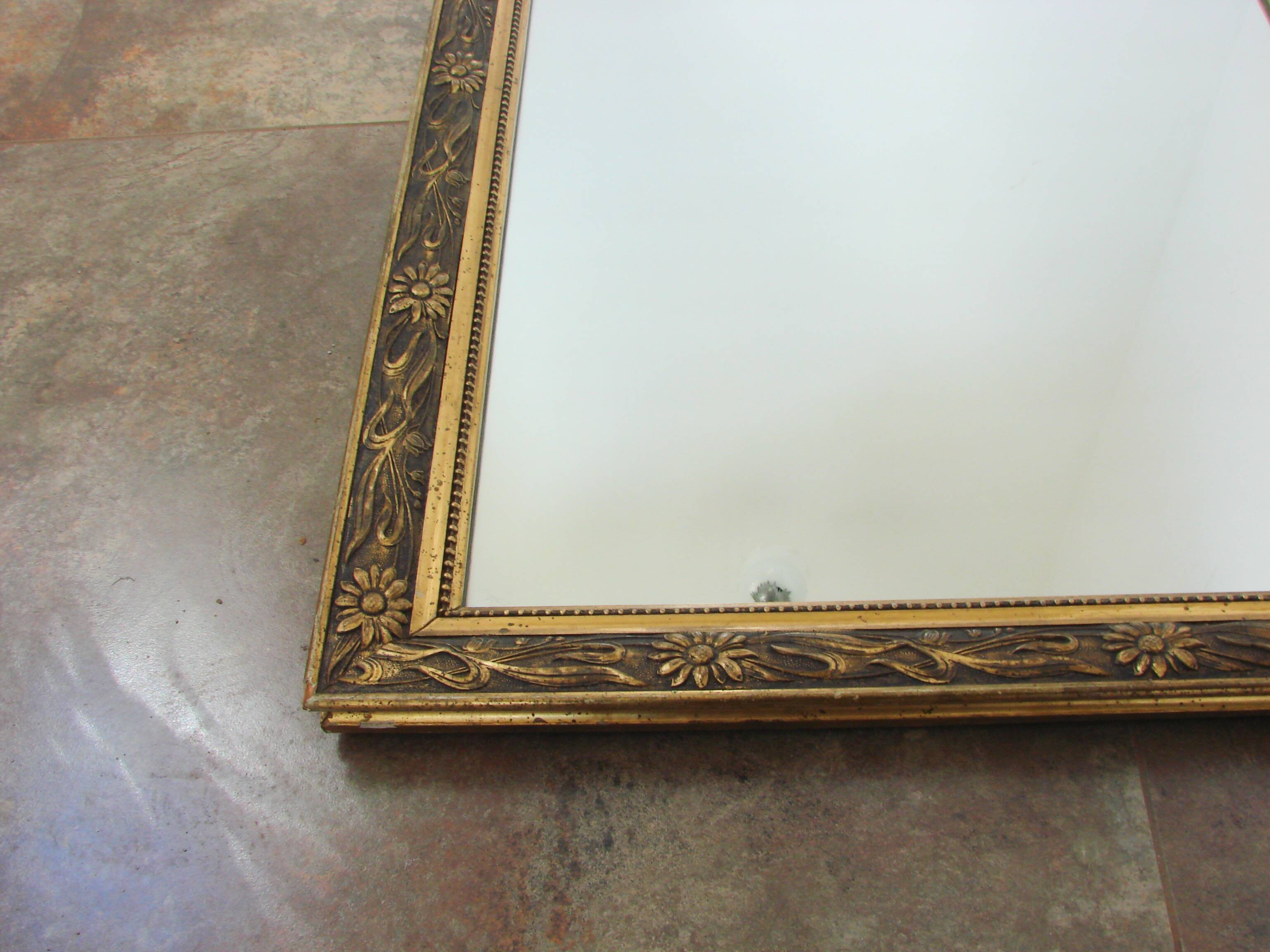 Wall mirror in an ornate frame, 1960s – vintage, gilded frame