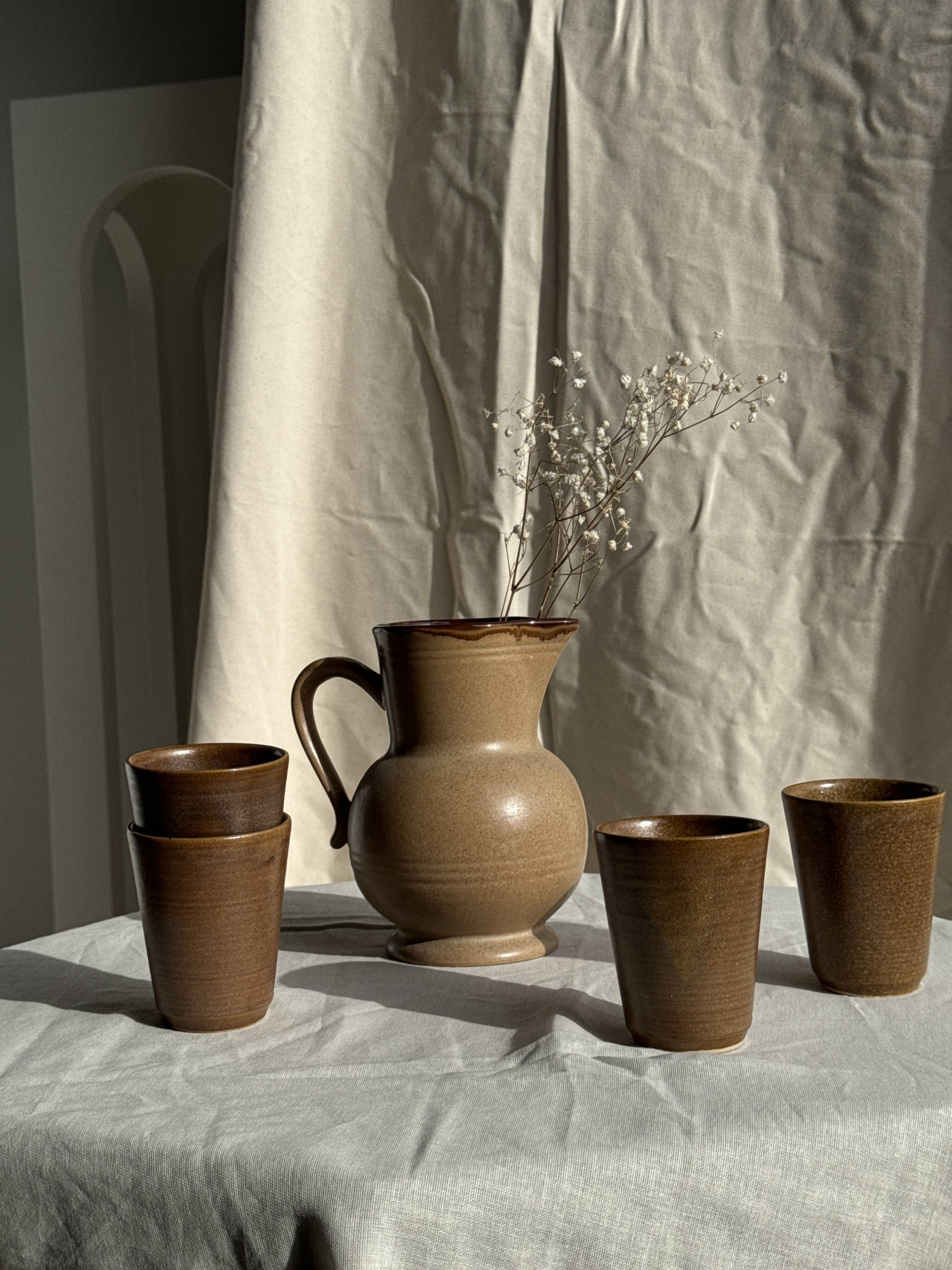 Set of 10 small stoneware mugs from Digoin.